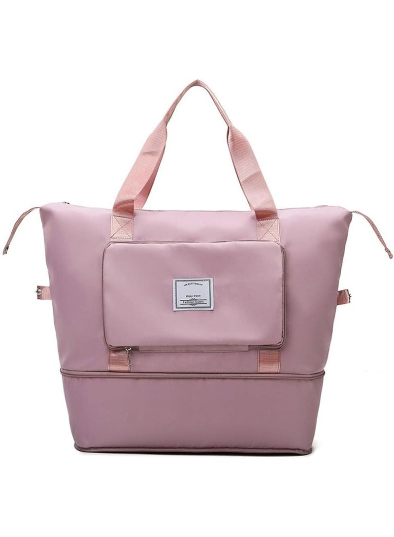 حقيبة متعددة الاستخدام يمكن طيّها بسهولة، وتحتوي على جيب أمامي وسحّاب علوي، كما يمكن تثبيتها على مقبض الحقيبة السفرية المصممة خصيصاً لتجمع بين الأناقة، الراحة، والعملية , لون بينك - Image 1