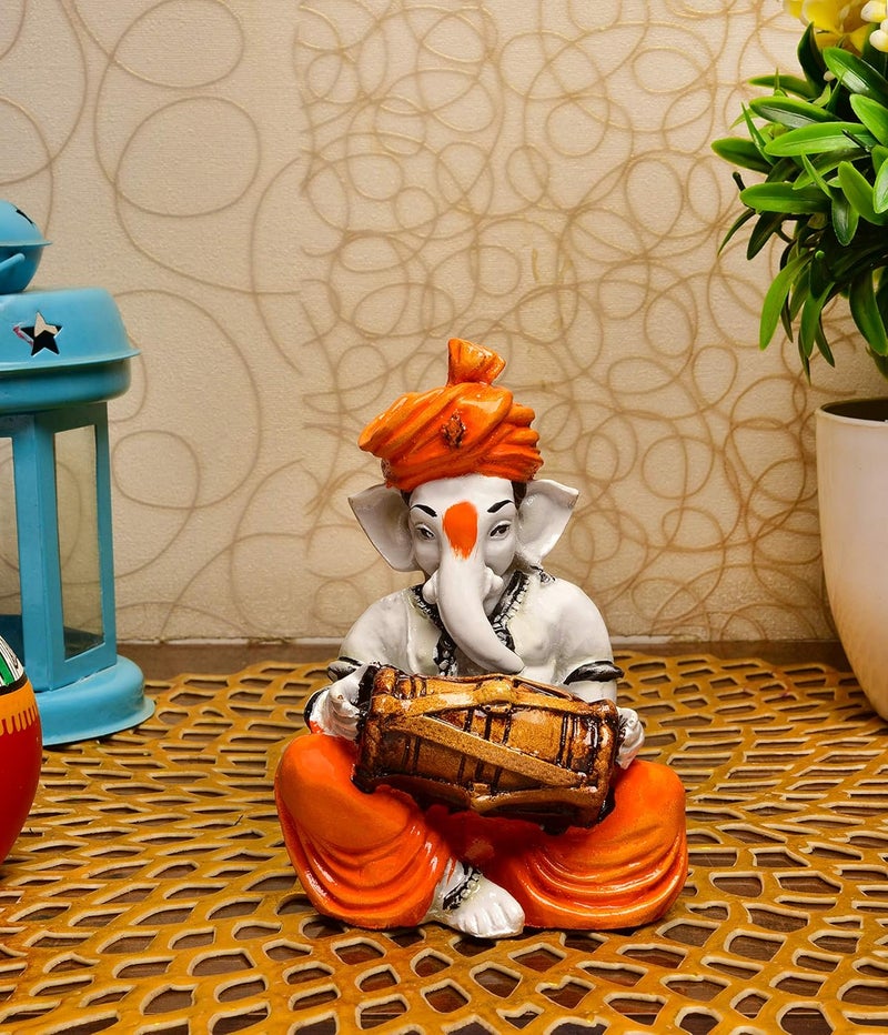 Karigaari India Polyresine Ganesha Playing Dholak Idol