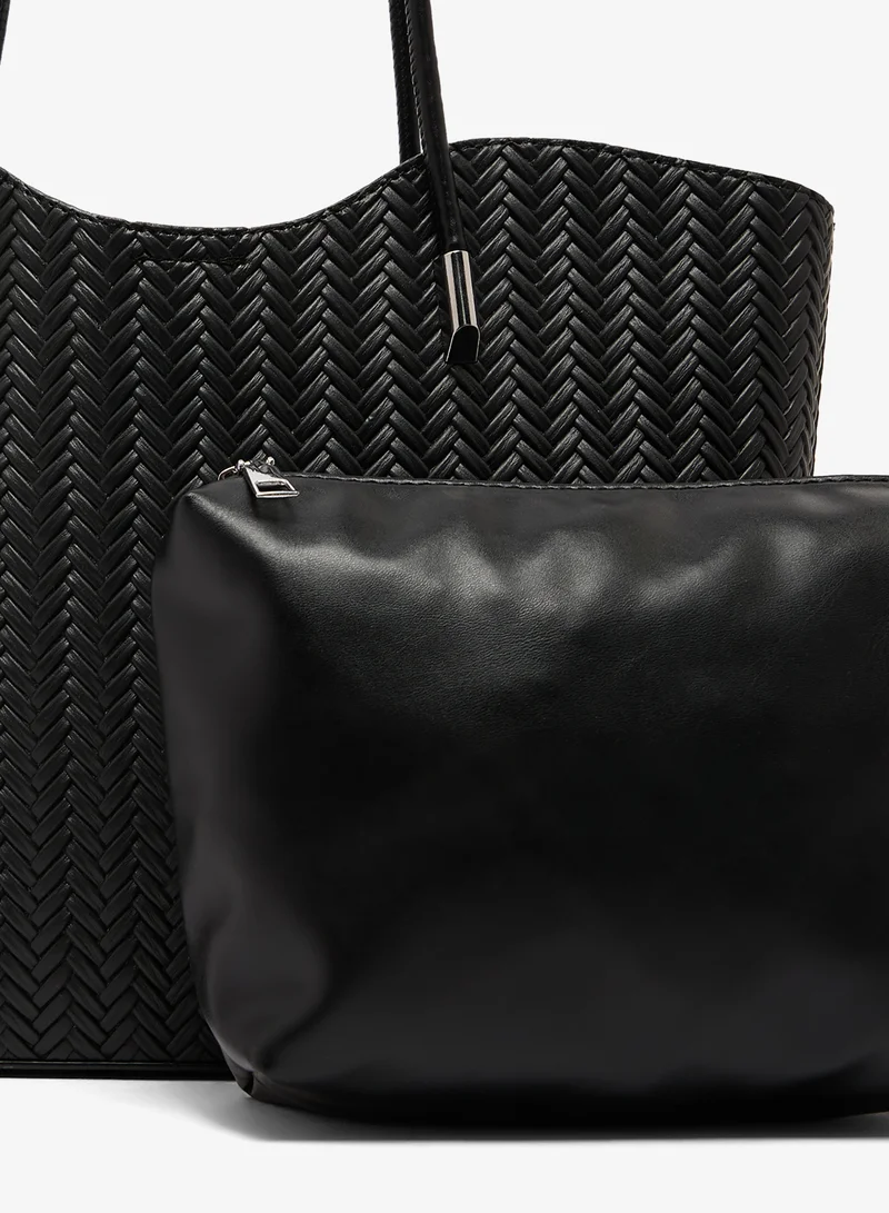 ايلا حقيبة يد من الرافييا بنقشة