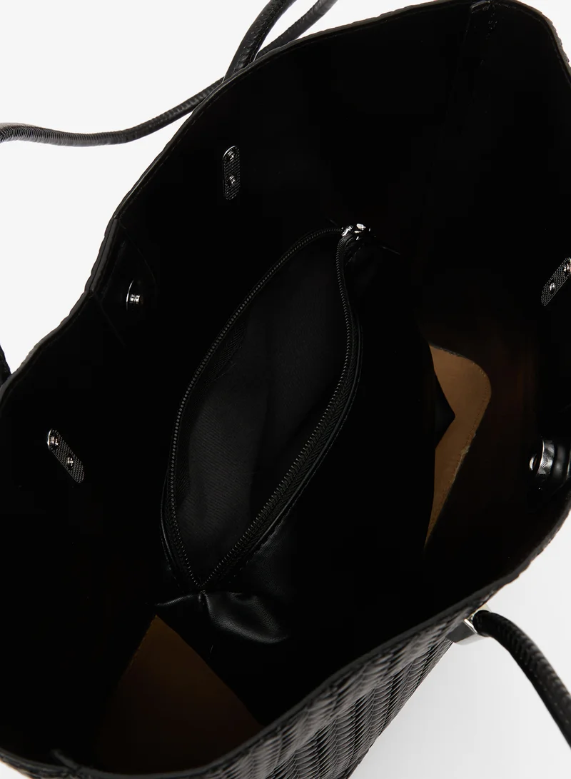 ايلا حقيبة يد من الرافييا بنقشة