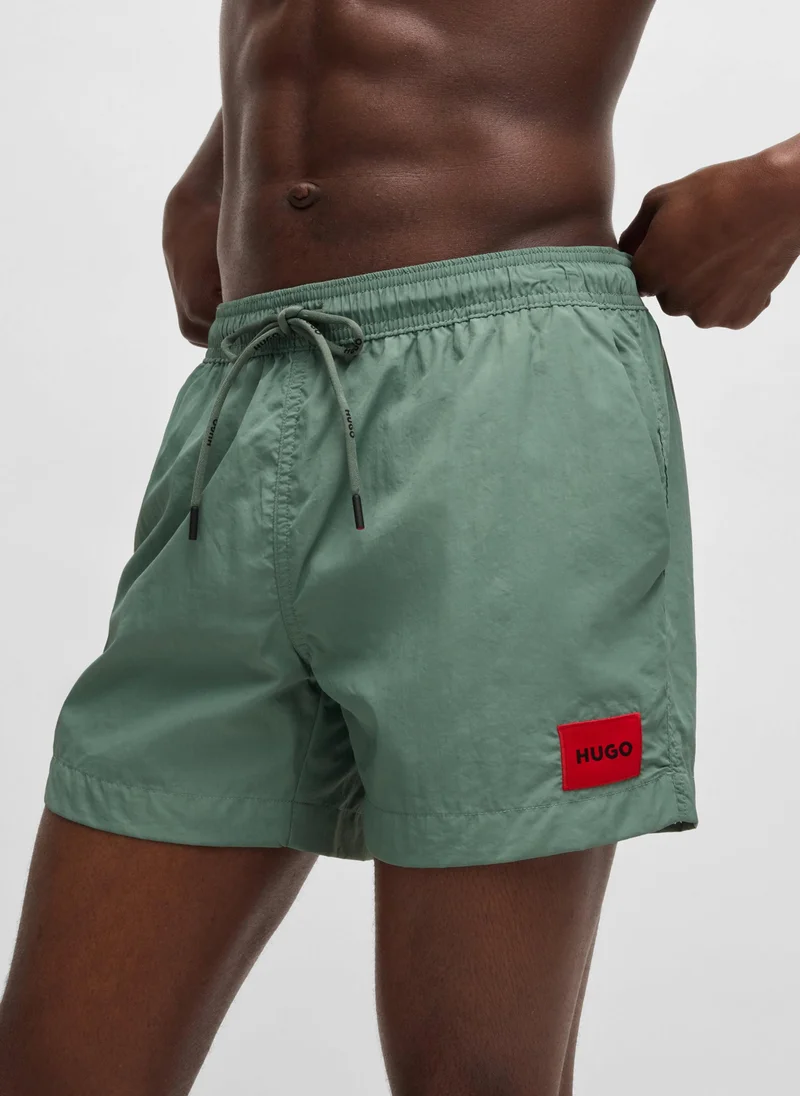 HUGO Quick-dry swim shorts with logo label