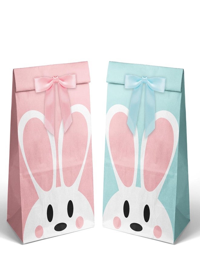 JarThenaAMCS أكياس هدايا حفلات عيد الفصح من JarThenaAMCS، 24 قطعة، بتصميم أرنب وردي وأزرق، مصنوعة من الورق المقوى ومزينة بشرائط. مثالية لتوزيع الحلوى والهدايا في حفلات الربيع، وحفلات استقبال المولود، وأعياد الميلاد. - Image 1