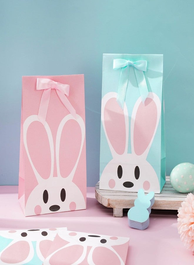 JarThenaAMCS أكياس هدايا حفلات عيد الفصح من JarThenaAMCS، 24 قطعة، بتصميم أرنب وردي وأزرق، مصنوعة من الورق المقوى ومزينة بشرائط. مثالية لتوزيع الحلوى والهدايا في حفلات الربيع، وحفلات استقبال المولود، وأعياد الميلاد. - Image 5