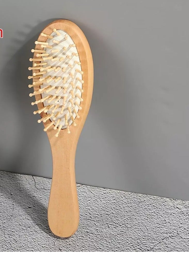 فرشاة شعر بيضاوية خشبية فاخرة بأسنان دبابيس مطاطية - لفك تشابك الشعر بسهولة، تدليك فروة الرأس، وتعزيز صحة الشعر - مثالية لجميع أنواع الشعر (جاف ومبلل) للرجال، النساء، والأطفال - Image 1