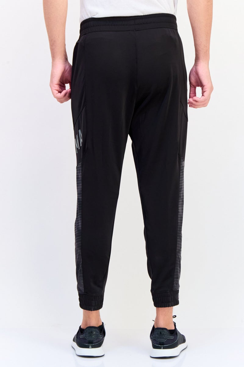 PUMA Men  Sportswear Fit Brand Logo Hyperwave Jogger Pants, Multicolor - Image 4