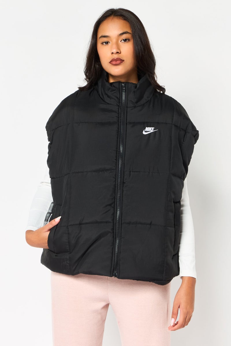 Nike Women Therma Fit Sleeveless Embroidered Logo Vest Jacket, Black - Image 1