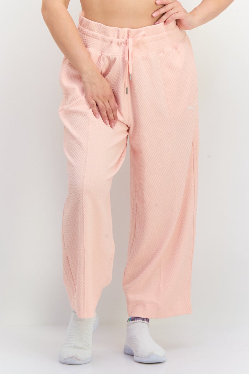 PUMA Women Sportswear Fit Outdoor Track Pants, Peach - Image 1