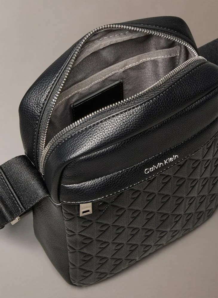CALVIN KLEIN EMBLEM EMBOSS REPORTER