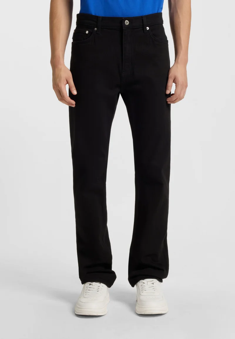 هوجو جينز ضيق بقماش دينم أسود مطاطي