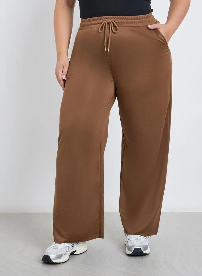 Styli Styli Plus Brown Wide Leg Joggers with Drawstring Waist