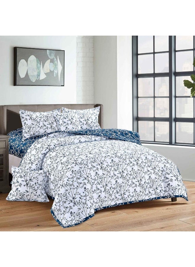 Double bed comforter set made of compressed microfiber, reversible with a floral pattern, and a pillowcase.