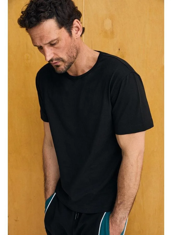Grimelange AXION Men's 100% Organic Cotton Round Neck Regular Fit Black T-Shirt.