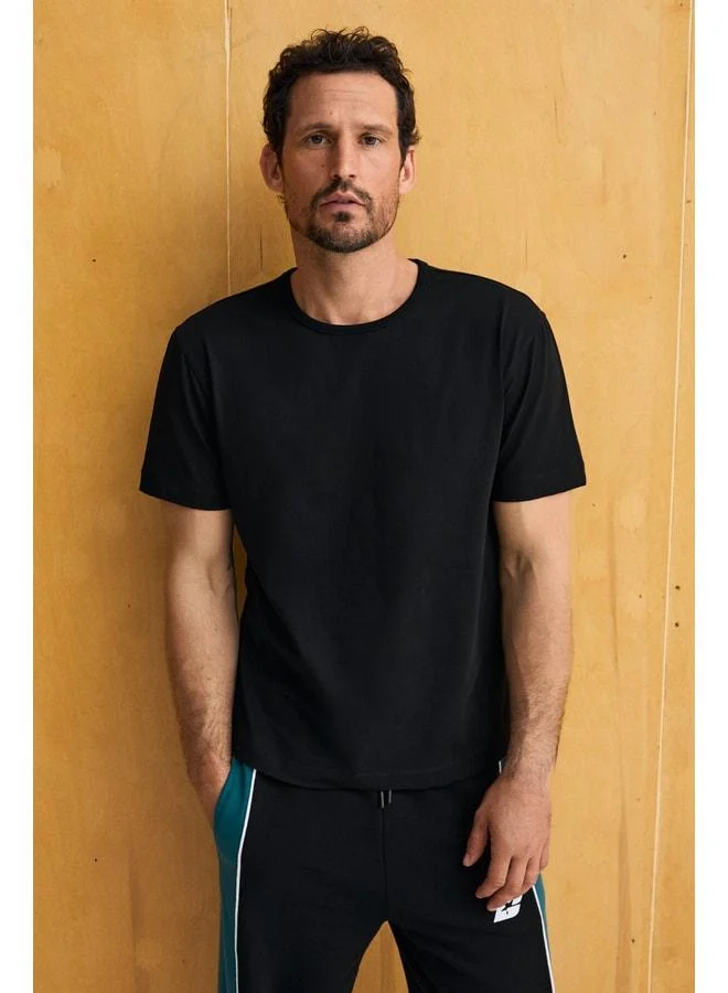 Grimelange AXION Men's 100% Organic Cotton Round Neck Regular Fit Black T-Shirt.