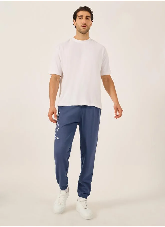 Styli Slogan Print Oversized Fit Cotton Terry Joggers