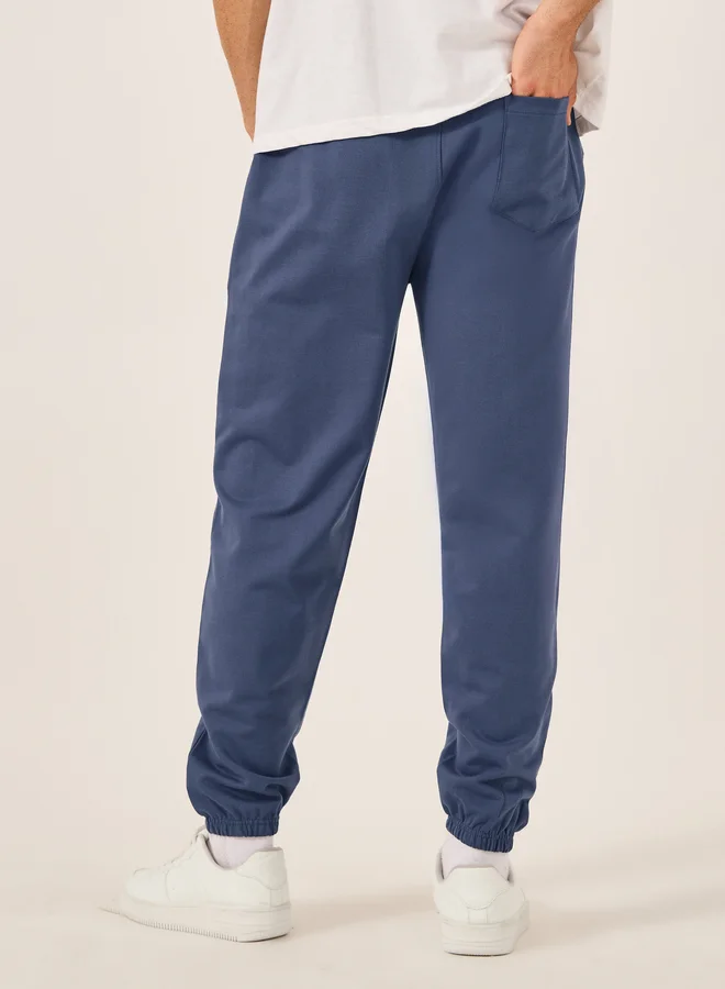 Styli Styli Slogan Print Oversized Fit Cotton Terry Joggers