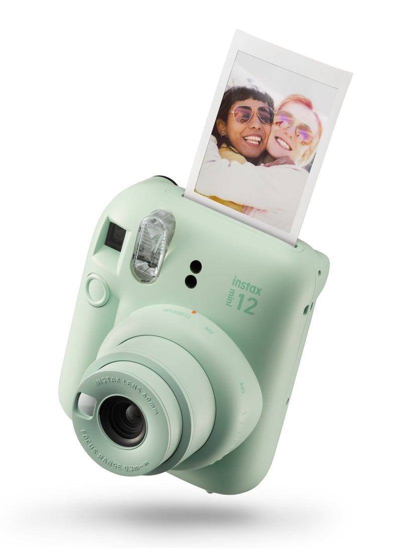 Instax - Mini 12  Christmas Gift Box  – Green Instant Mini 12 Camera with Green Case, Rainbow Mini Film, Photo Frame, Pegs and Batteries – Perfect Christmas Gift for Kids, Teens, and Adults - Image 1