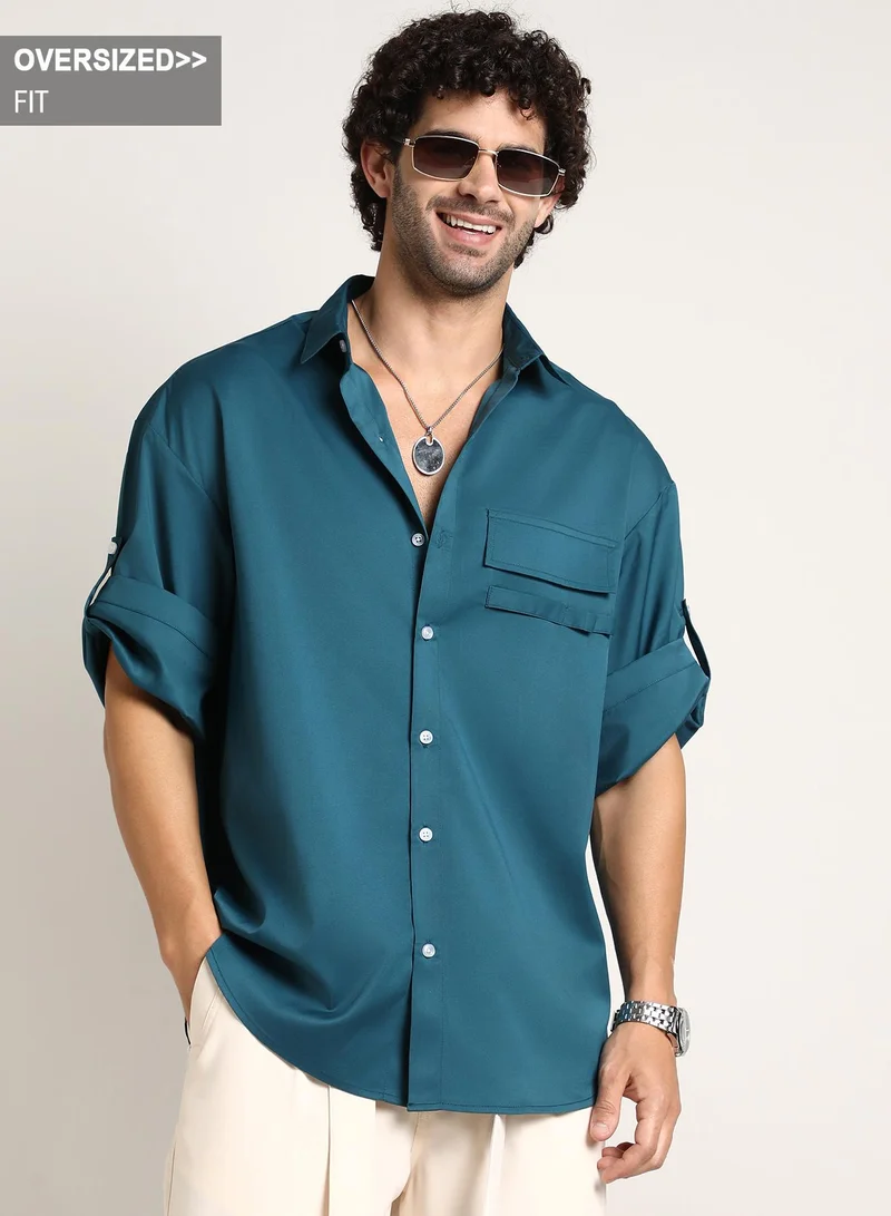 Campus Sutra Campus Sutra Men's Teal Green Satin-Utility Oversized Shirt For Casual Wear | Spread Collar | Short Regular Sleeves | Button Closure | Oversized Shirt Crafted With Comfort Fit For Everyday Wear
