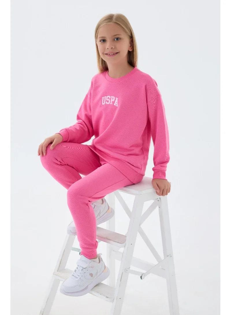 يو اس بولو اسن طقم رياضي للبنات من يو إس بولو أسوسيشن باللون الوردي