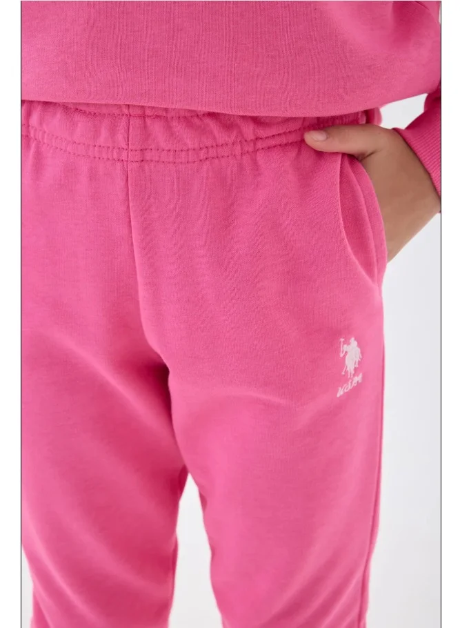 يو اس بولو اسن طقم رياضي للبنات من يو إس بولو أسوسيشن باللون الوردي