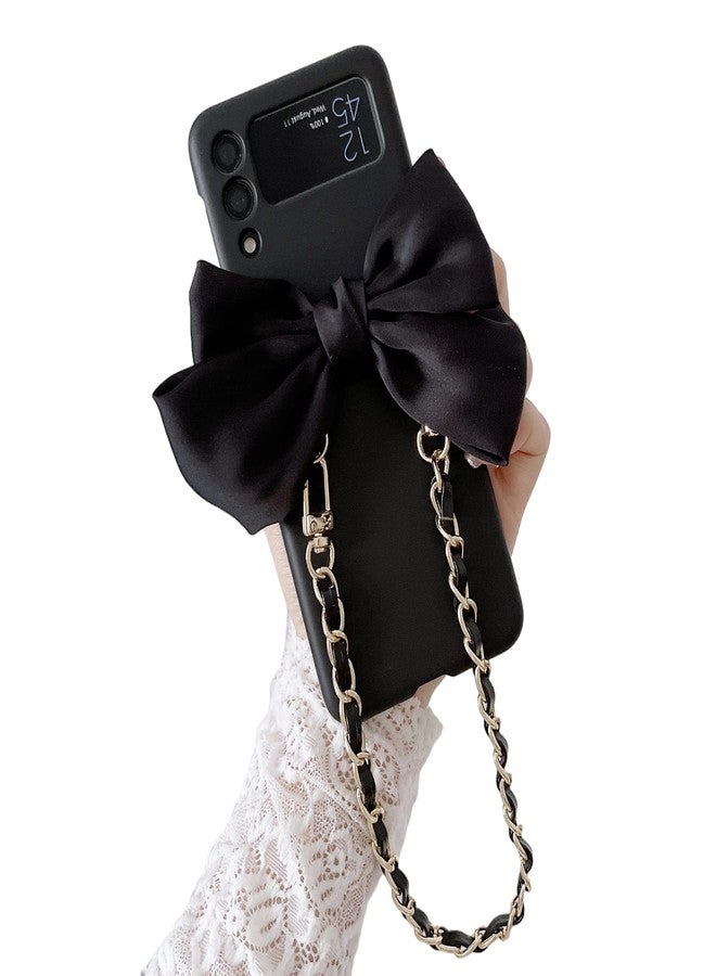 أوميو جراب Omio مصمم خصيصًا لهاتف سامسونج جالاكسي زد فليب 4، مزود بسوار معدني قابل للفصل، جراب أنيق للفتيات والسيدات، تصميم فاخر ثلاثي الأبعاد على شكل فيونكة، غطاء مقاوم للصدمات من البولي كربونات لهاتف جالاكسي زد فليب 4 5G باللون الأسود - Image 1