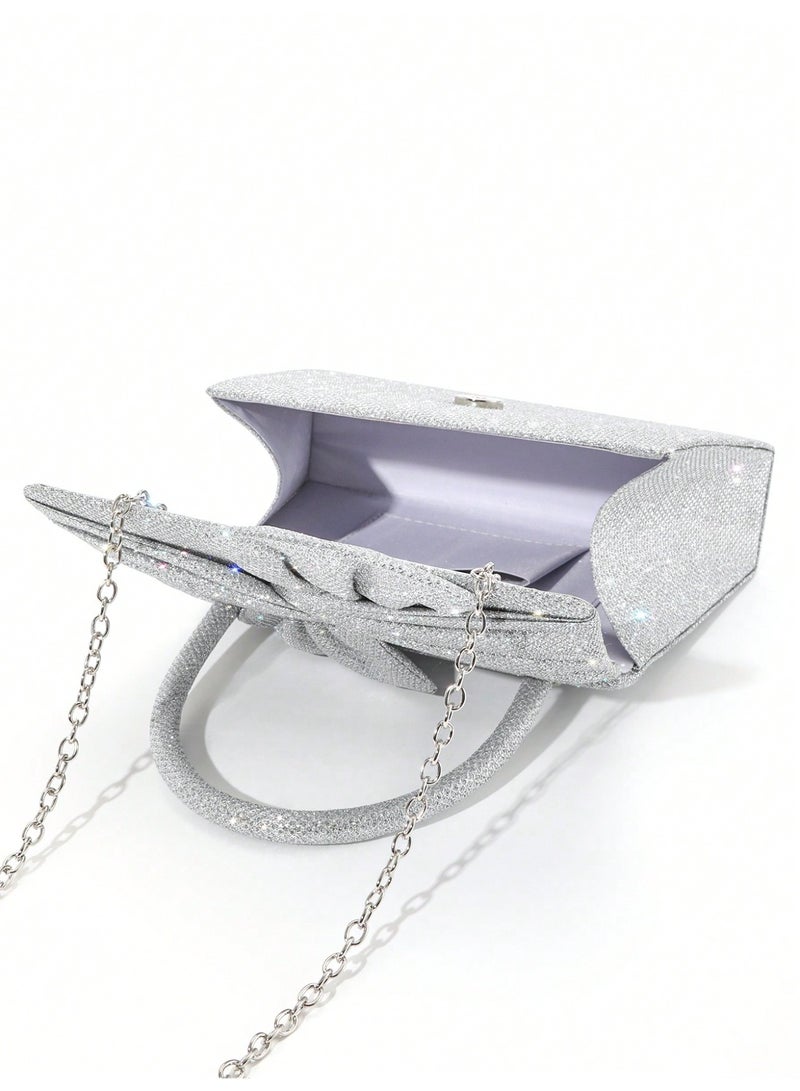 حقيبة سهرة نسائية كلتش بتصميم فيونكة لامعة مع مقبض علوي وسلسلة معدنية – حقيبة أنيقة للمناسبات والسهرات - Image 3