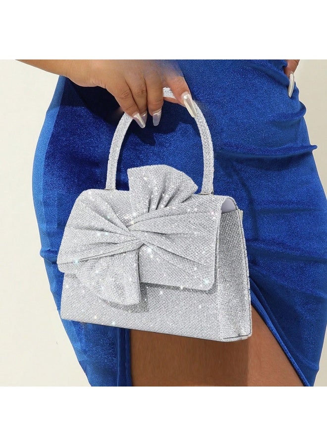 حقيبة سهرة نسائية كلتش بتصميم فيونكة لامعة مع مقبض علوي وسلسلة معدنية – حقيبة أنيقة للمناسبات والسهرات - Image 2