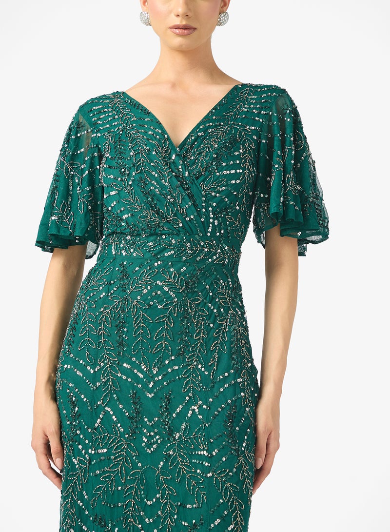 بيوت فستان ماكسي فيونكا مزين بالترتر بياقة على شكل حرف - Image 3