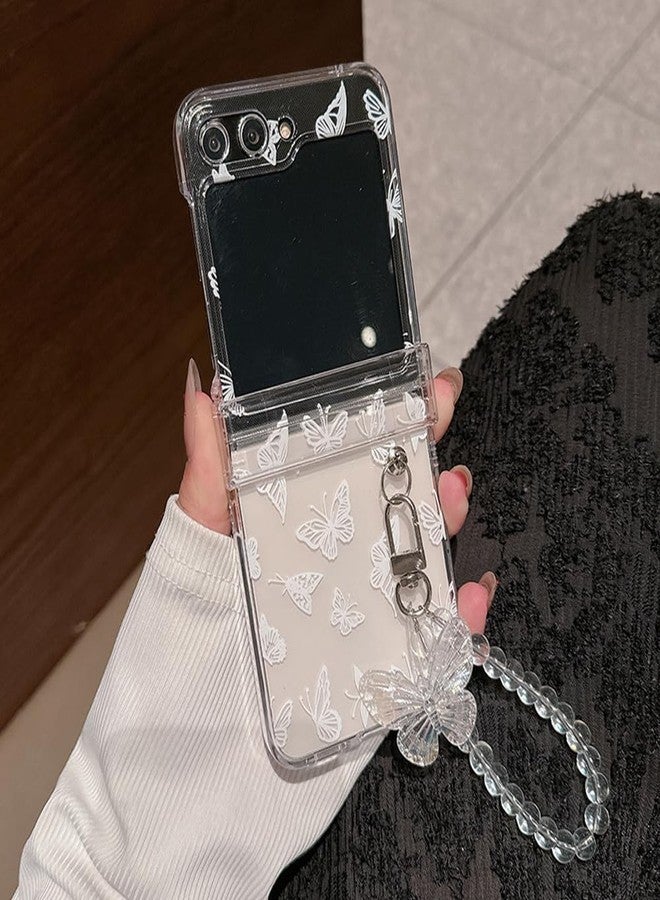 أوميو جراب Omio لهاتف Galaxy Z Flip 6 مع سوار وحزام بتصميم فراشة لطيفة، مناسب للفتيات والسيدات، مزود بسلسلة يد وحبل تعليق، تصميم نحيف بمفصلات لحماية الهاتف، غطاء شفاف مقاوم للصدمات مصنوع من البولي كربونات الصلب، لون أبيض. - Image 1