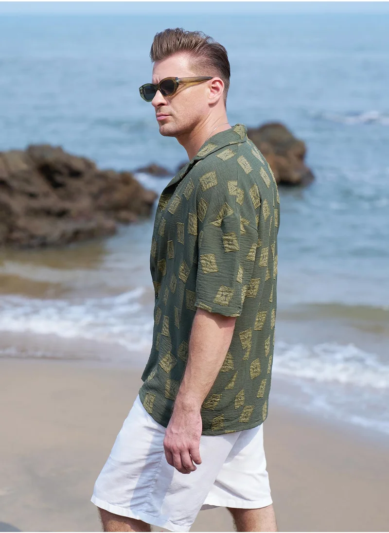 Campus Sutra Campus Sutra Men's Olive Green Indie-Cuban Oversized Shirt For Casual Wear | Cuban Collar | Short Regular Sleeves | Button Closure | Oversized Shirt Crafted With Comfort Fit For Everyday Wear