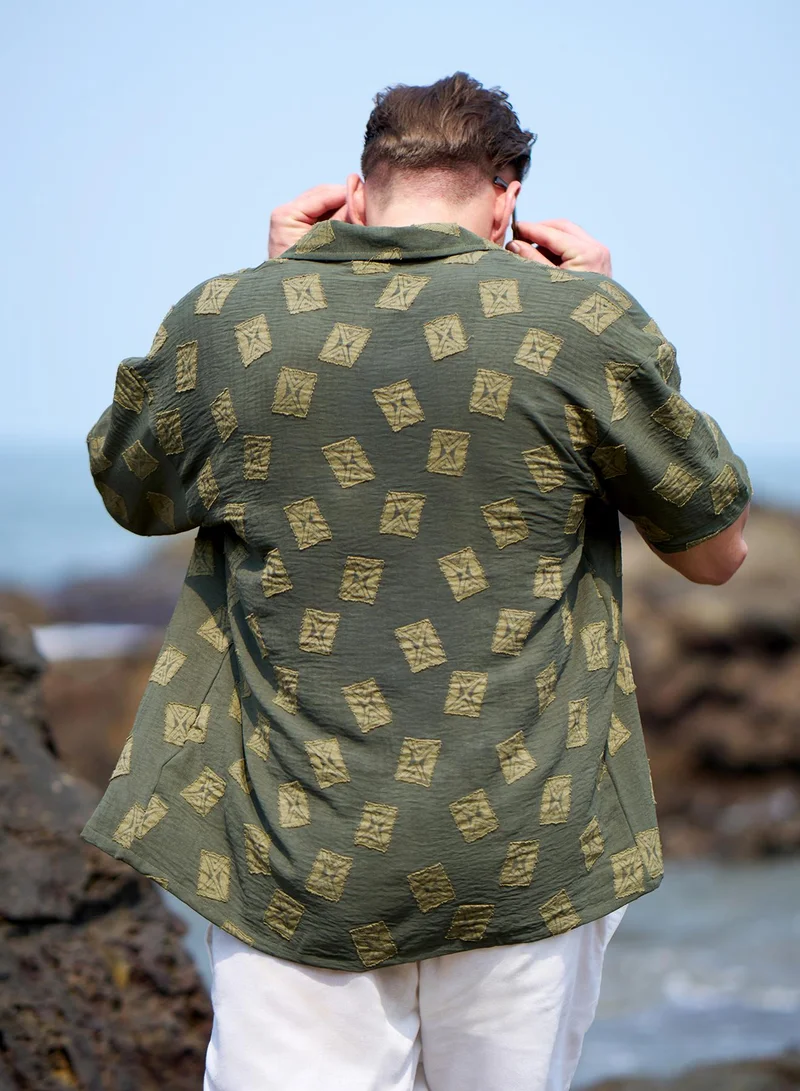 Campus Sutra Campus Sutra Men's Olive Green Indie-Cuban Oversized Shirt For Casual Wear | Cuban Collar | Short Regular Sleeves | Button Closure | Oversized Shirt Crafted With Comfort Fit For Everyday Wear