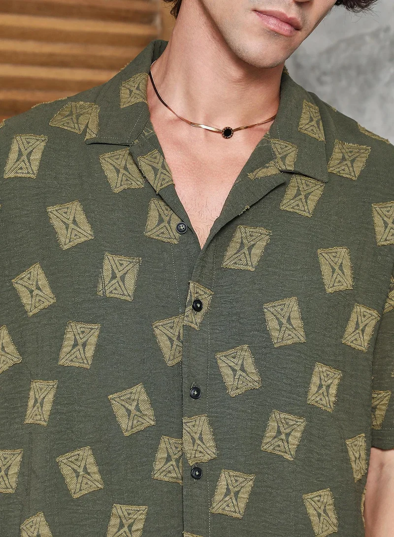 Campus Sutra Campus Sutra Men's Olive Green Indie-Cuban Oversized Shirt For Casual Wear | Cuban Collar | Short Regular Sleeves | Button Closure | Oversized Shirt Crafted With Comfort Fit For Everyday Wear