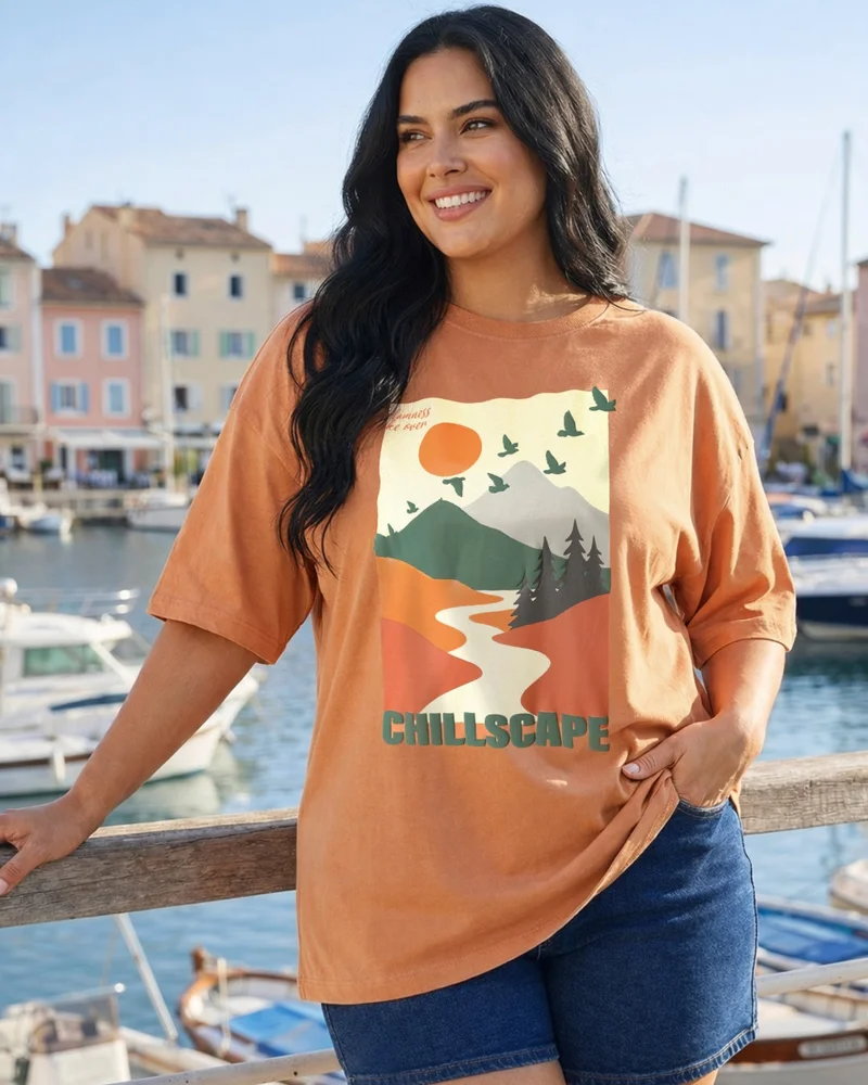 بيواكوف تيشيرت نسائي كبير الحجم بطبعة جرافيك باللون الكراميل والبرتقالي