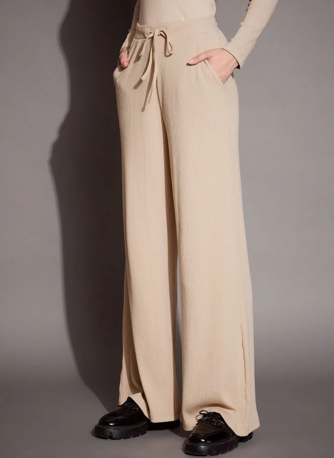 ساسافراس بنطلون رياضي نسائي مريح بلون بيج