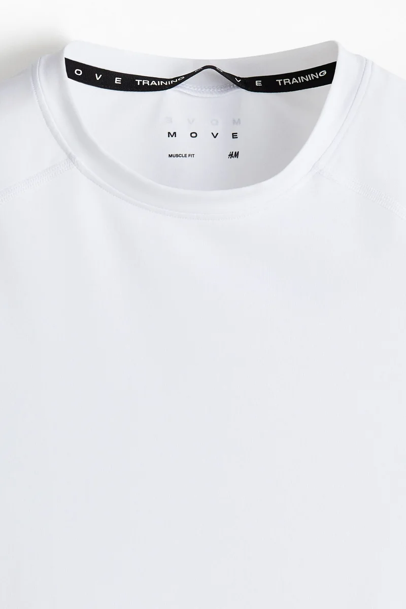 اتش اند ام بلوزة رياضية بقصّة محددة للجسم من قماش دراي موف