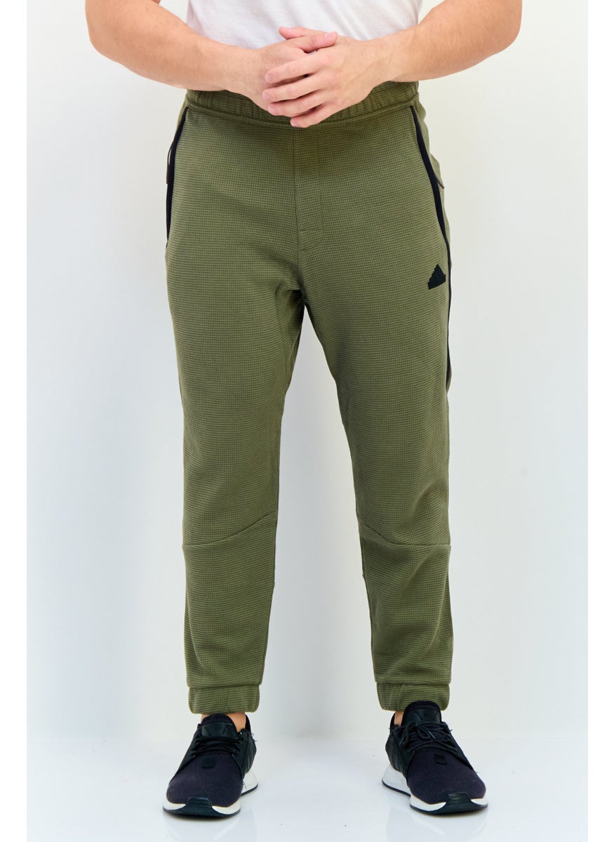 Adidas Men Sportswear Fit Outdoor Sweatpants, Olive  - Image 1