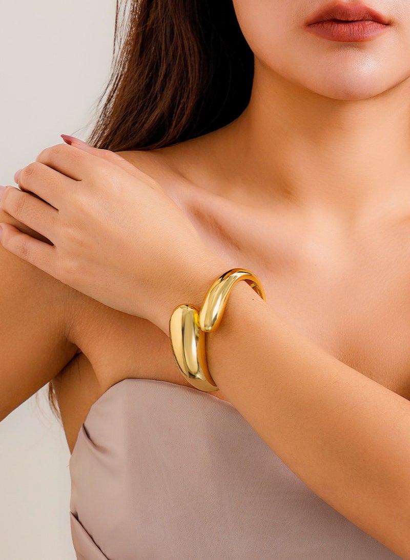 Shine Bright: Exaggerated Mirror-Finish Metal Bracelet  - Image 1