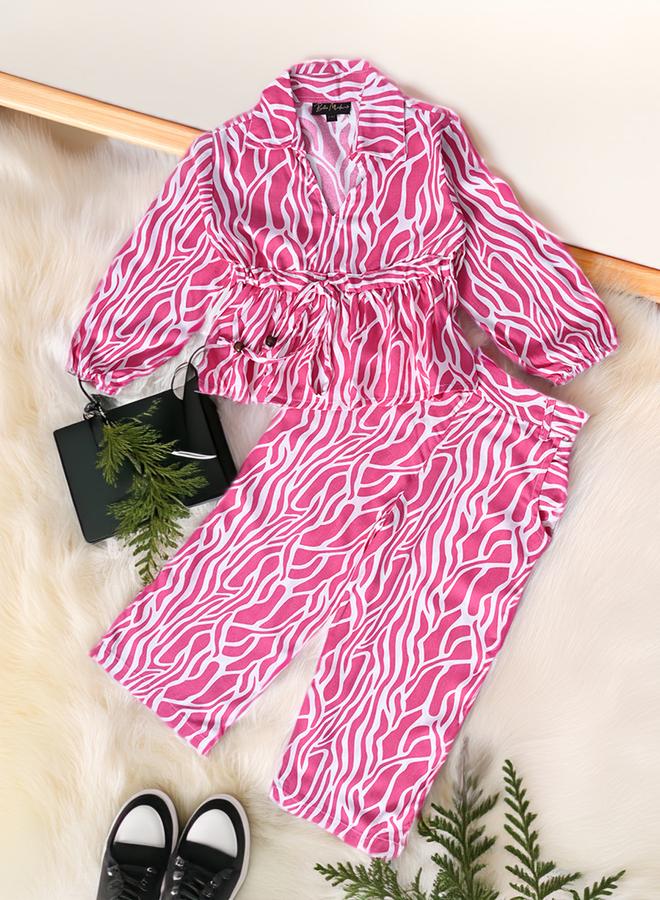 بيلا مودا طقم منسق من بنطال وبلوزة مطبعة بالكامل - Image 1