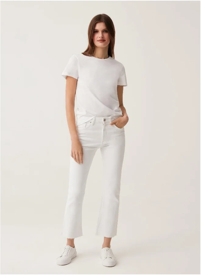 او في اس OVS Flare-Fit Jeans With Raw Edging