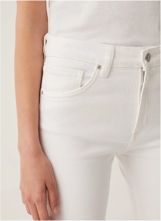 او في اس OVS Flare-Fit Jeans With Raw Edging
