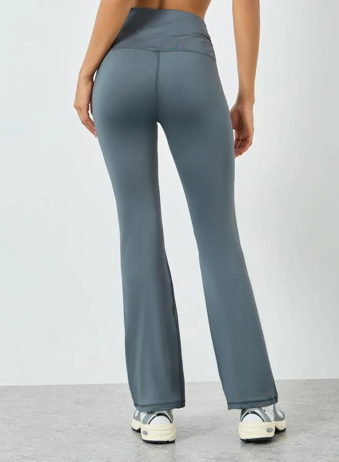 Styli Active  Charcoal Ruched Waist Flared Leggings for Women | Best Price UAE