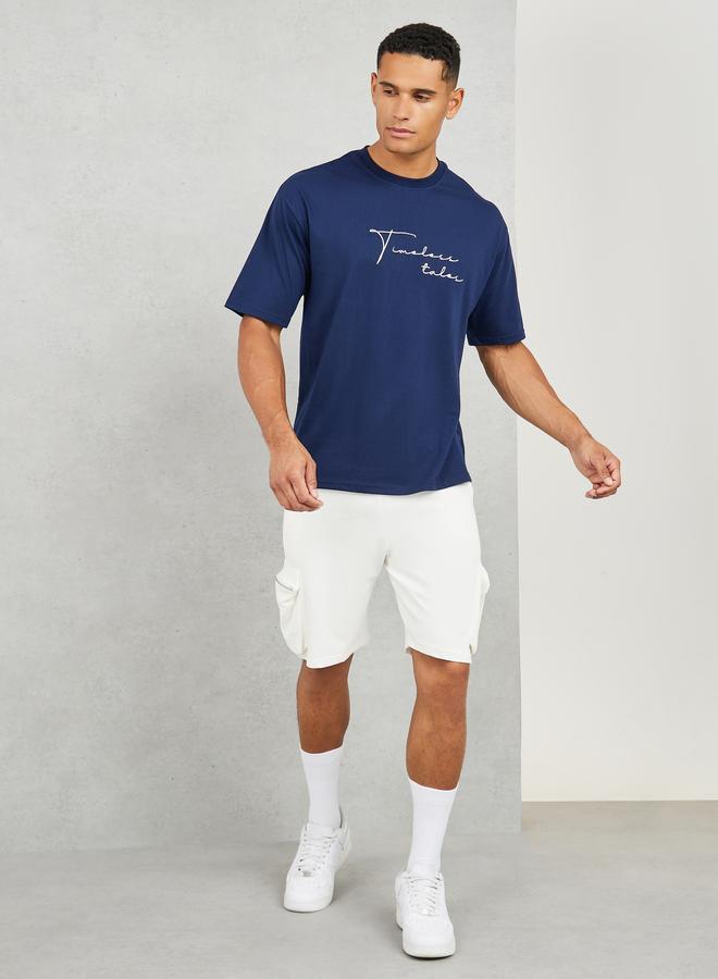 Styli Styli Cotton Rich Oversized Embroidered Timeless Tales T-Shirt  - Image 2
