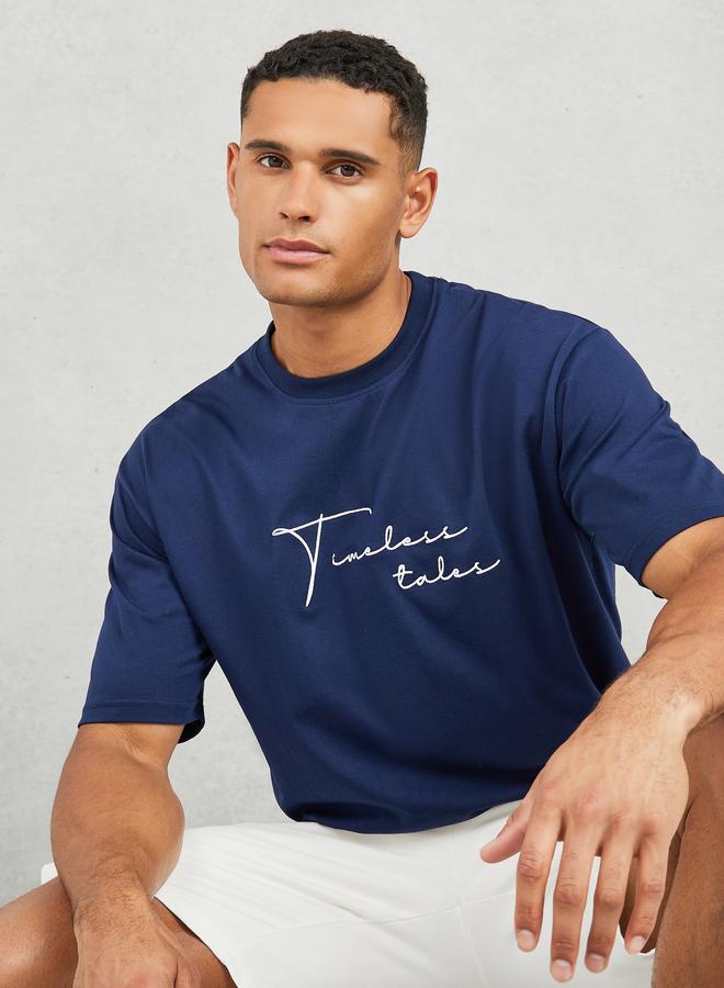 Styli Styli Cotton Rich Oversized Embroidered Timeless Tales T-Shirt  - Image 1