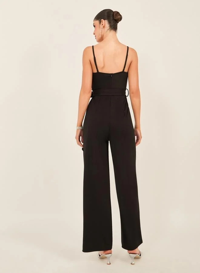 Styli Solid Strappy Wide Leg Jumpsuit with Waist Tie-Up Detail