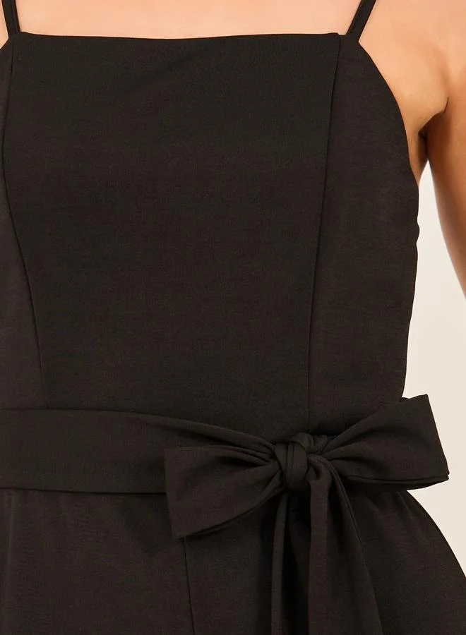 Styli Solid Strappy Wide Leg Jumpsuit with Waist Tie-Up Detail