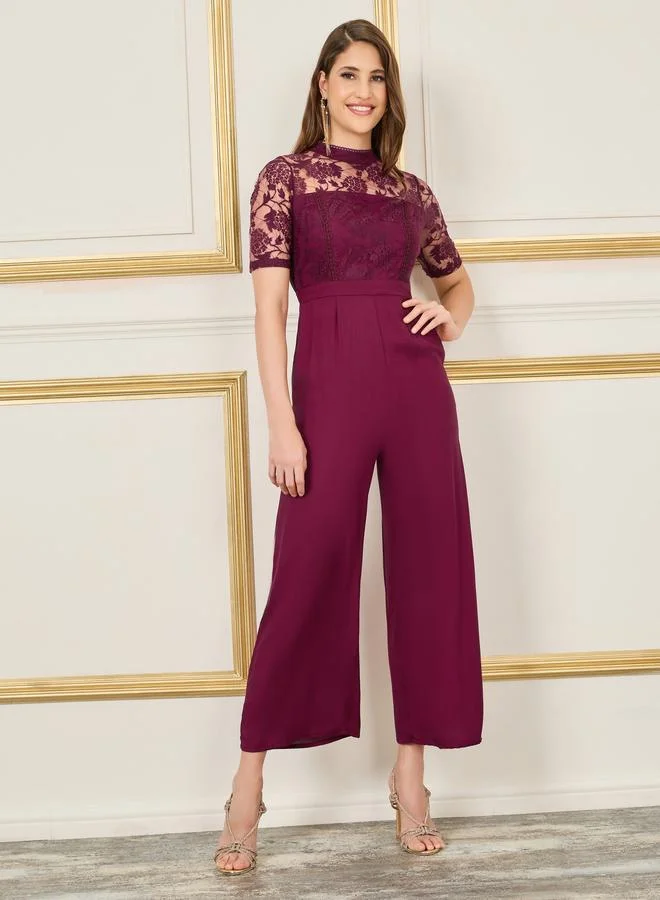 ستايلي Lace Detail High Neck Wide Leg Jumpsuit