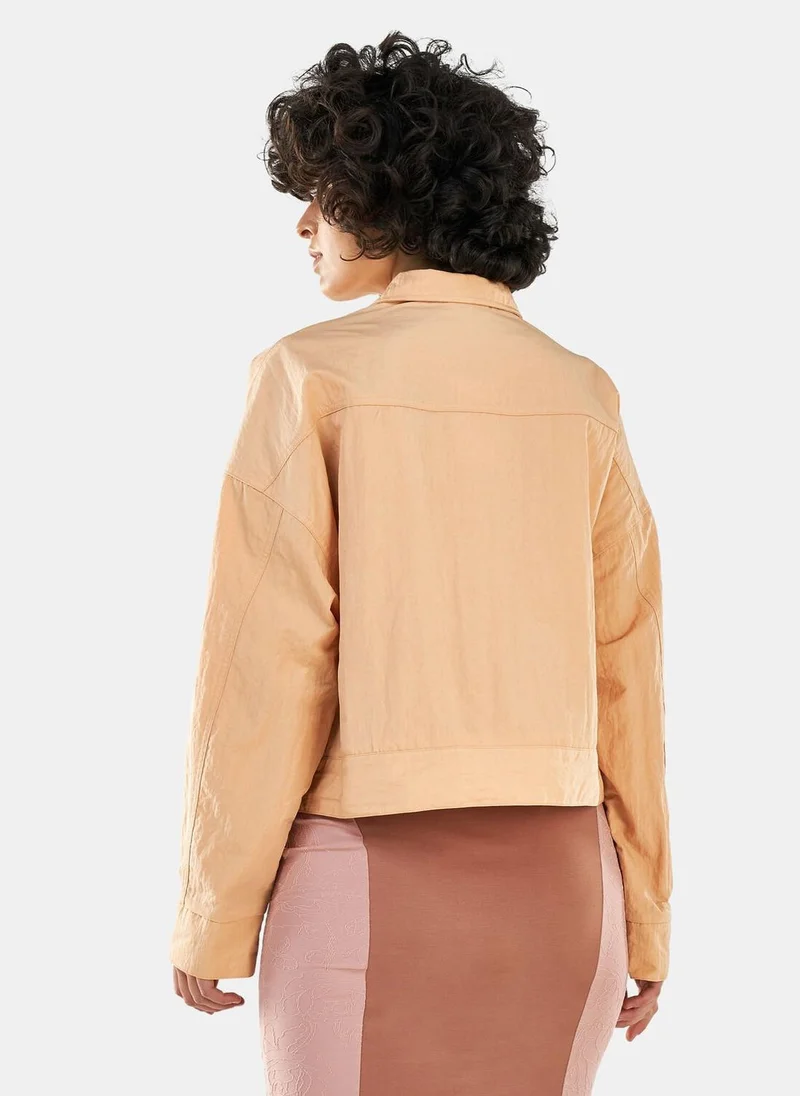 نايكي جاكيت سبورتسوير اسينشال ووفن للنساء