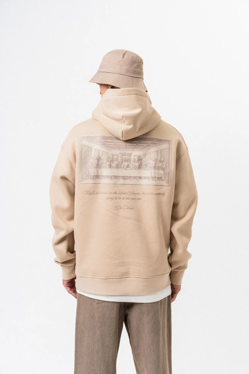 ريسباير هودي رجالي واسع (Oversize) بغطاء رأس مطبوع بعبارة "Da Vinci" لون بيج