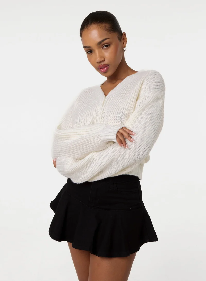 بينك فانيلا كارديجان قصير بأزرار