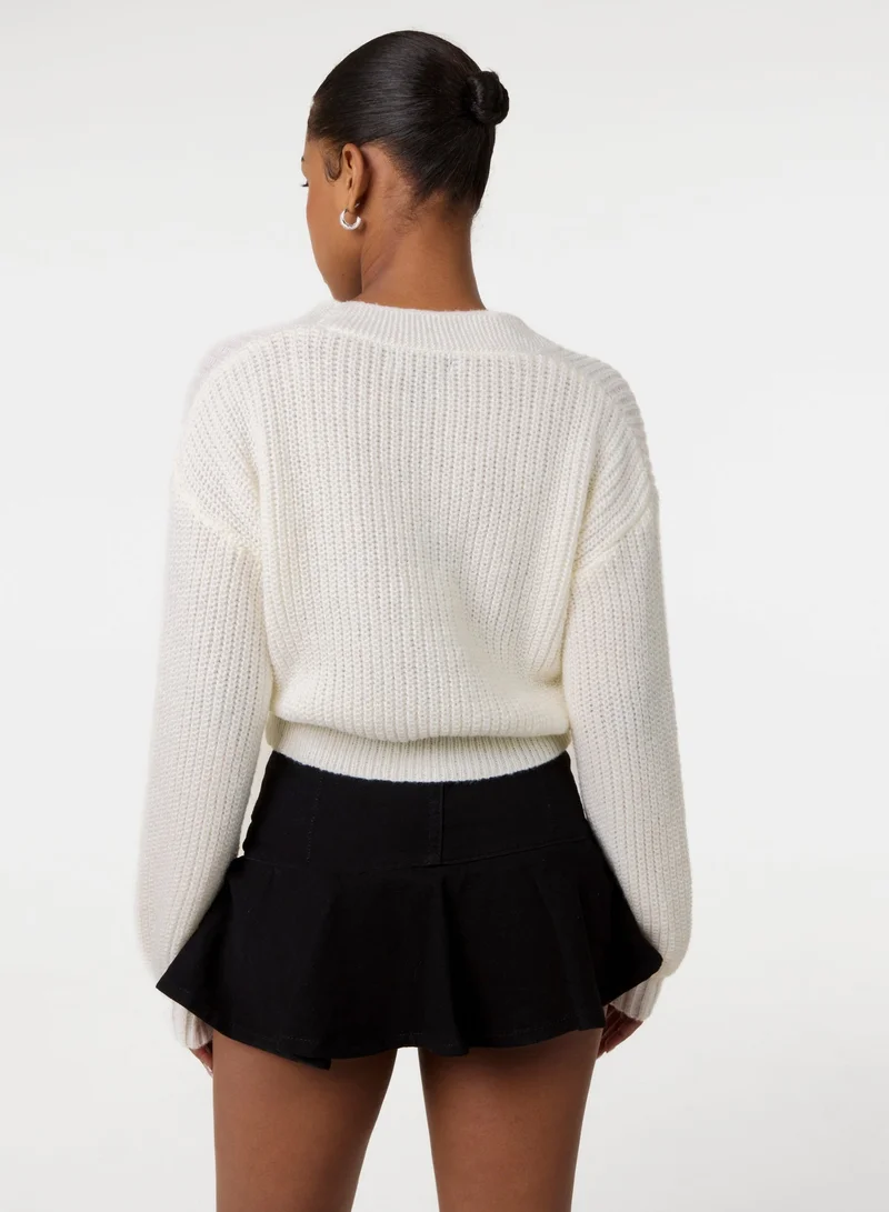 بينك فانيلا كارديجان قصير بأزرار