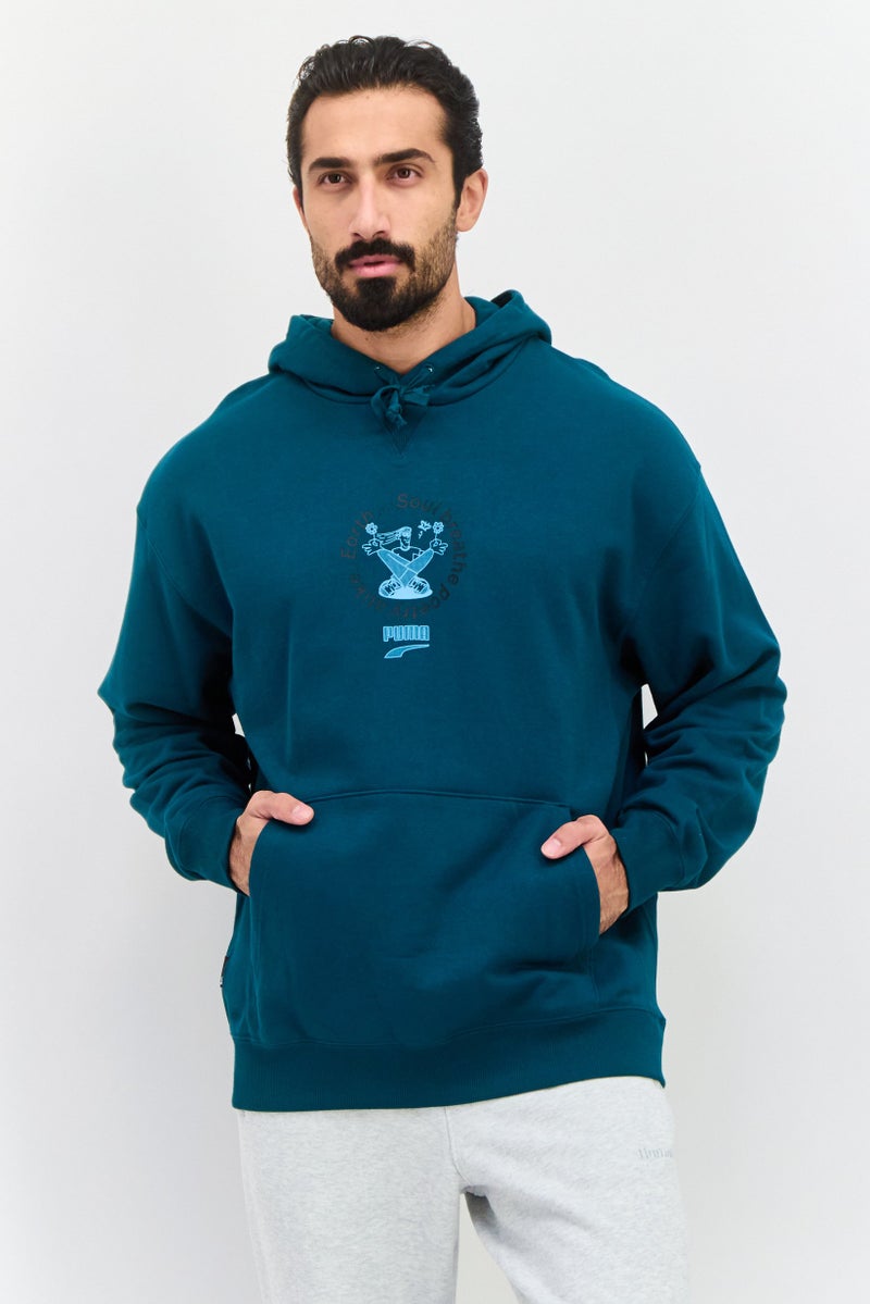 PUMA Men Relaxed Fit Long Sleeve Outdoor Hoodie, Teal - Image 1